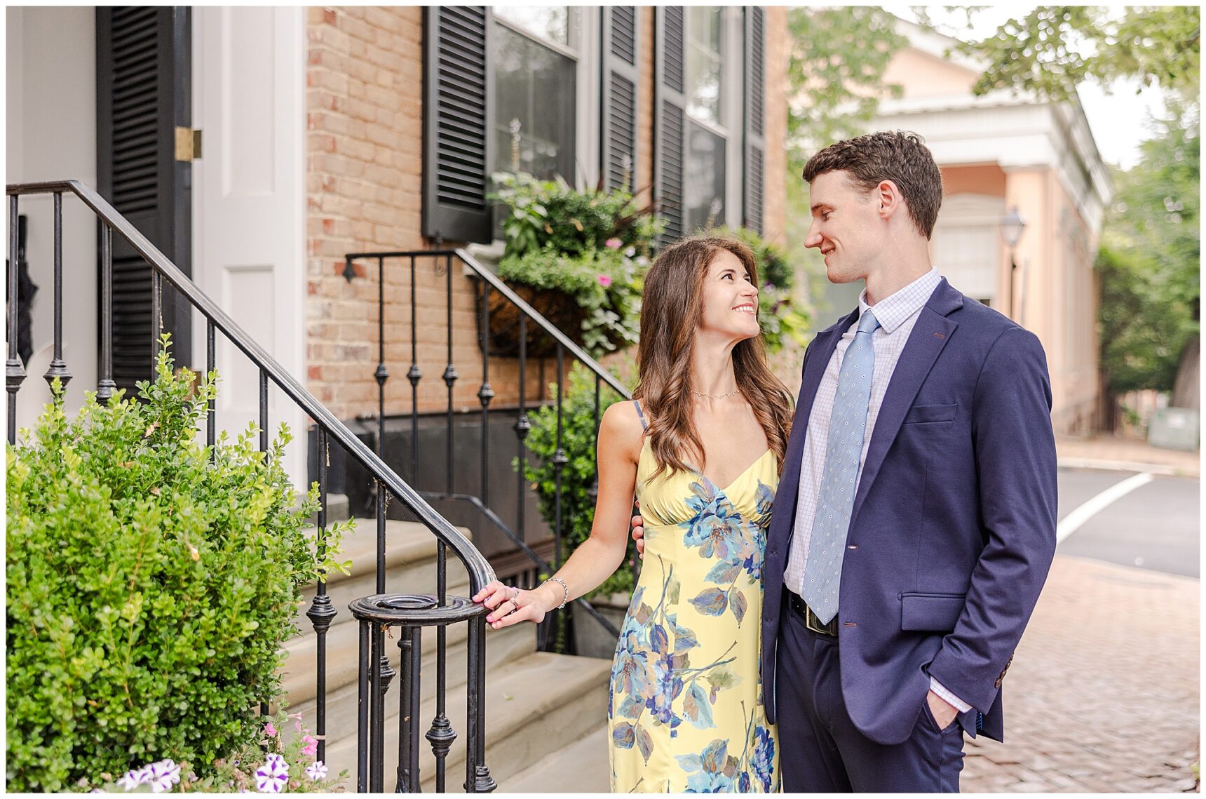 Timeless engagement photos on the cobblestone streets of Old Town Alexandria, Engagement portraits at Old Town Alexandria waterfront,Alexandria engagement photographer capturing candid moments in Old Town,Old Town Alexandria engagement photos showcasing historic charm and character,Romantic engagement photos in Downtown Alexandria featuring historic architecture