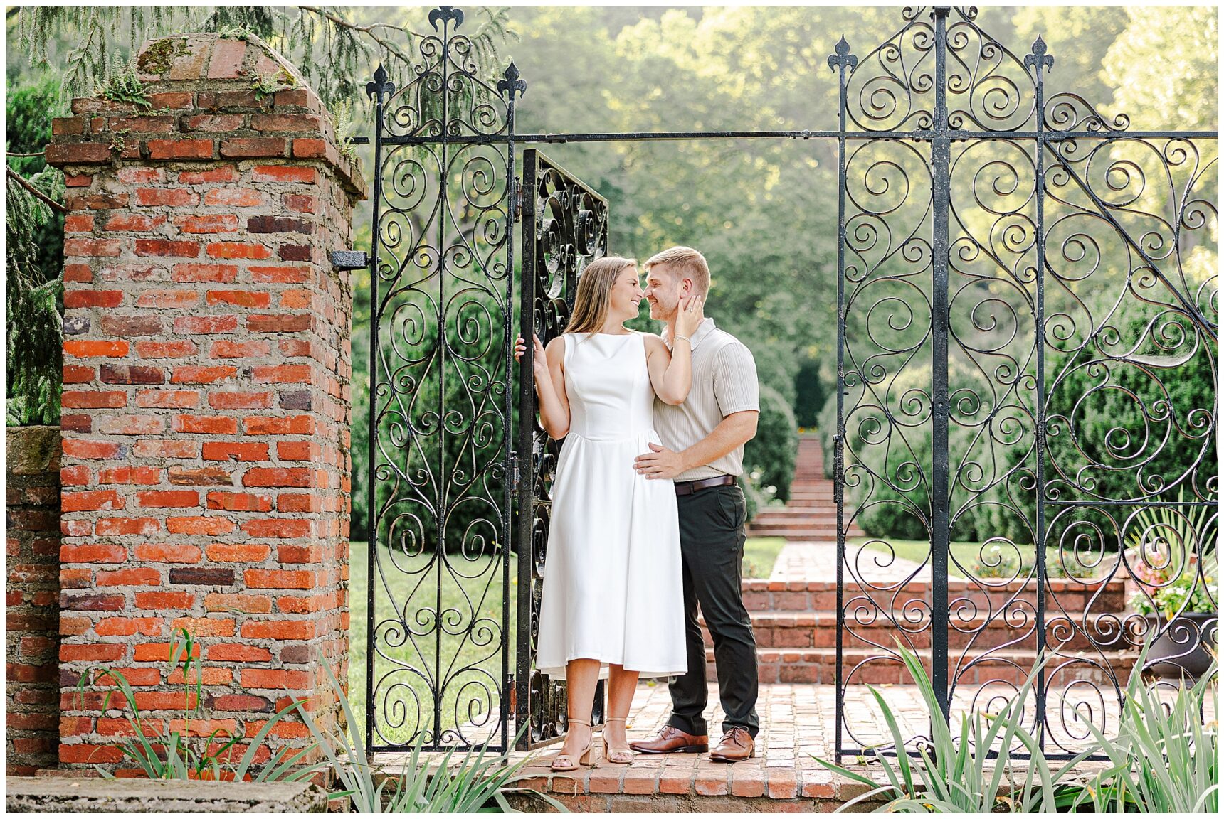Sarah wearing a classic flowing white dress during her Morven Park engagement session