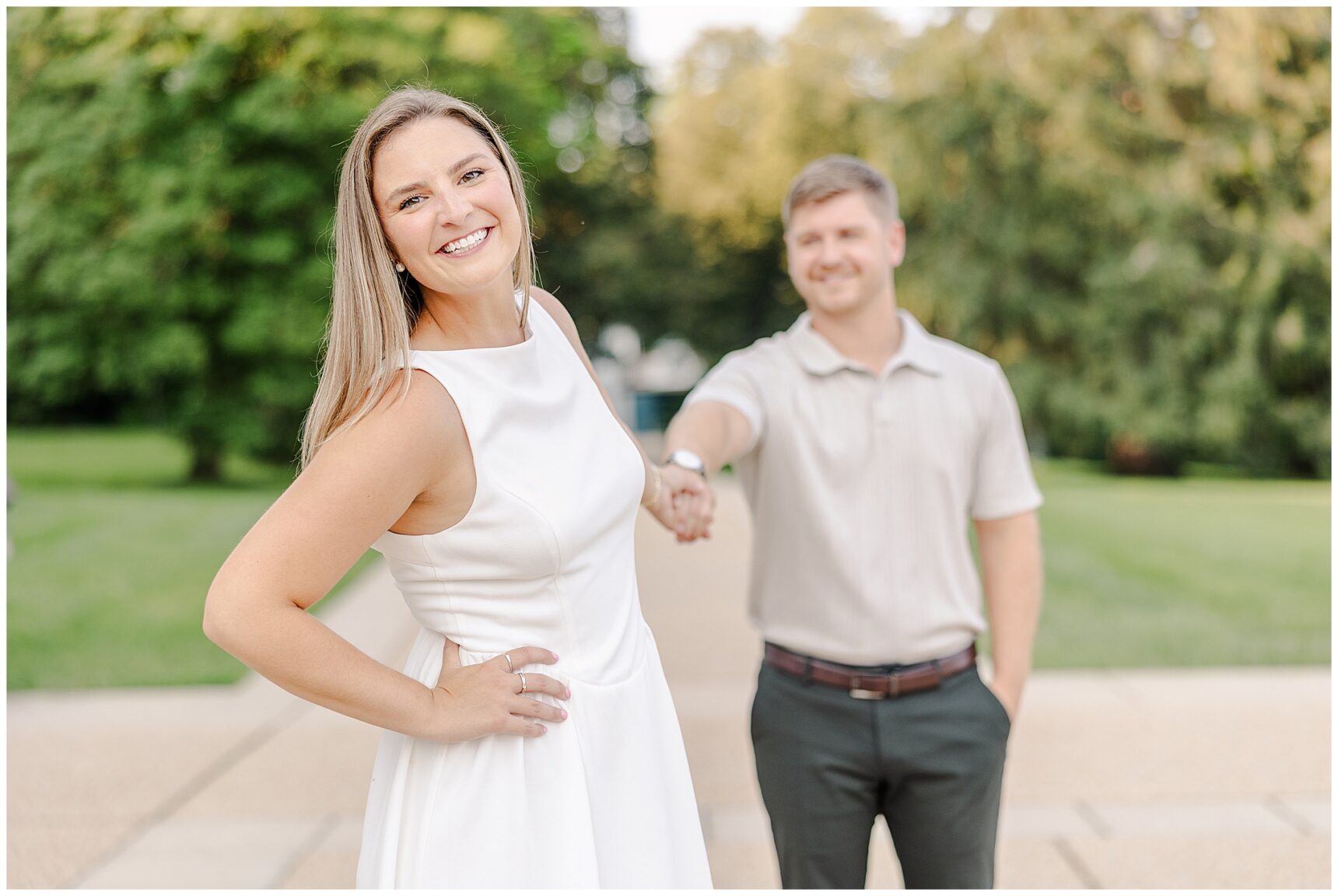 Candid engagement portrait of Sarah and Ian laughing together at Morven Park